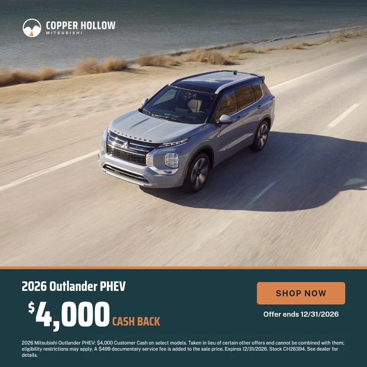 A cash back banner over a photo of the Outlander PHEV on a coastal road