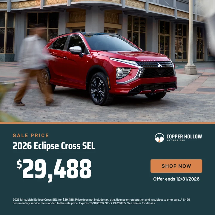 A sale price banner with a city photo of the Eclipse Cross above a brand panel
